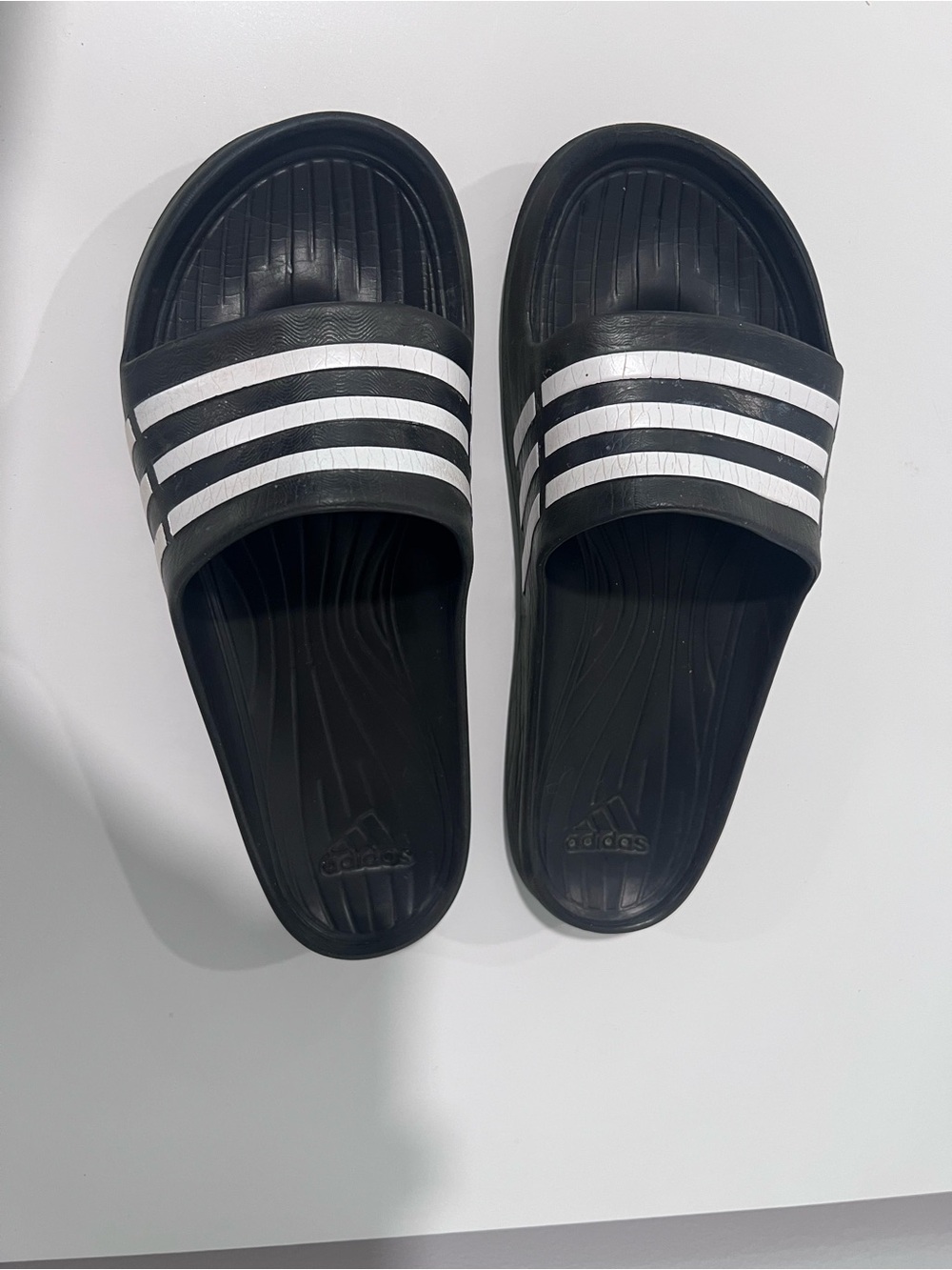 adidas Black Slides with White Three-Stripe Strap